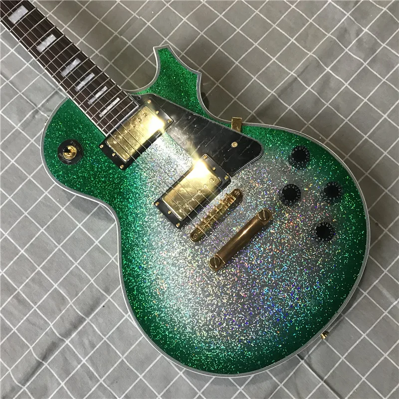 aukštos kokybės 6 styginiai elektrinė gitara, raudonmedžio korpusas su metalo žali dažai, aukso aparatūros, gera garso kokybė